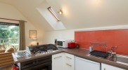 fully appointed kitchen in open plan living space